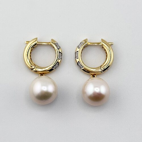 Серьги с бриллиантами и жемчугом из желтого золота 585 пробы