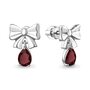 Серьги "Бантики" с гранатами из серебра 925 пробы