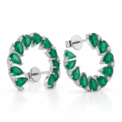 Серьги с изумрудами и бриллиантами из белого золота 585 пробы
