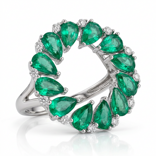 Кольцо с изумрудами и бриллиантами из белого золота 585 пробы