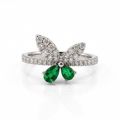 Кольцо "Бабочка" с изумрудами и бриллиантами из белого золота 585 пробы