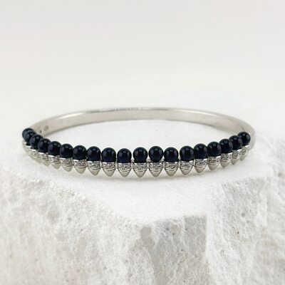 Браслет с фианитами и жемчугом из серебра 925 пробы