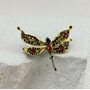 Брошь "Стрекоза" со шпинелью и гранатами из серебра 925 пробы с позолотой арт. YC02938_BRP_SP_GR_BJ