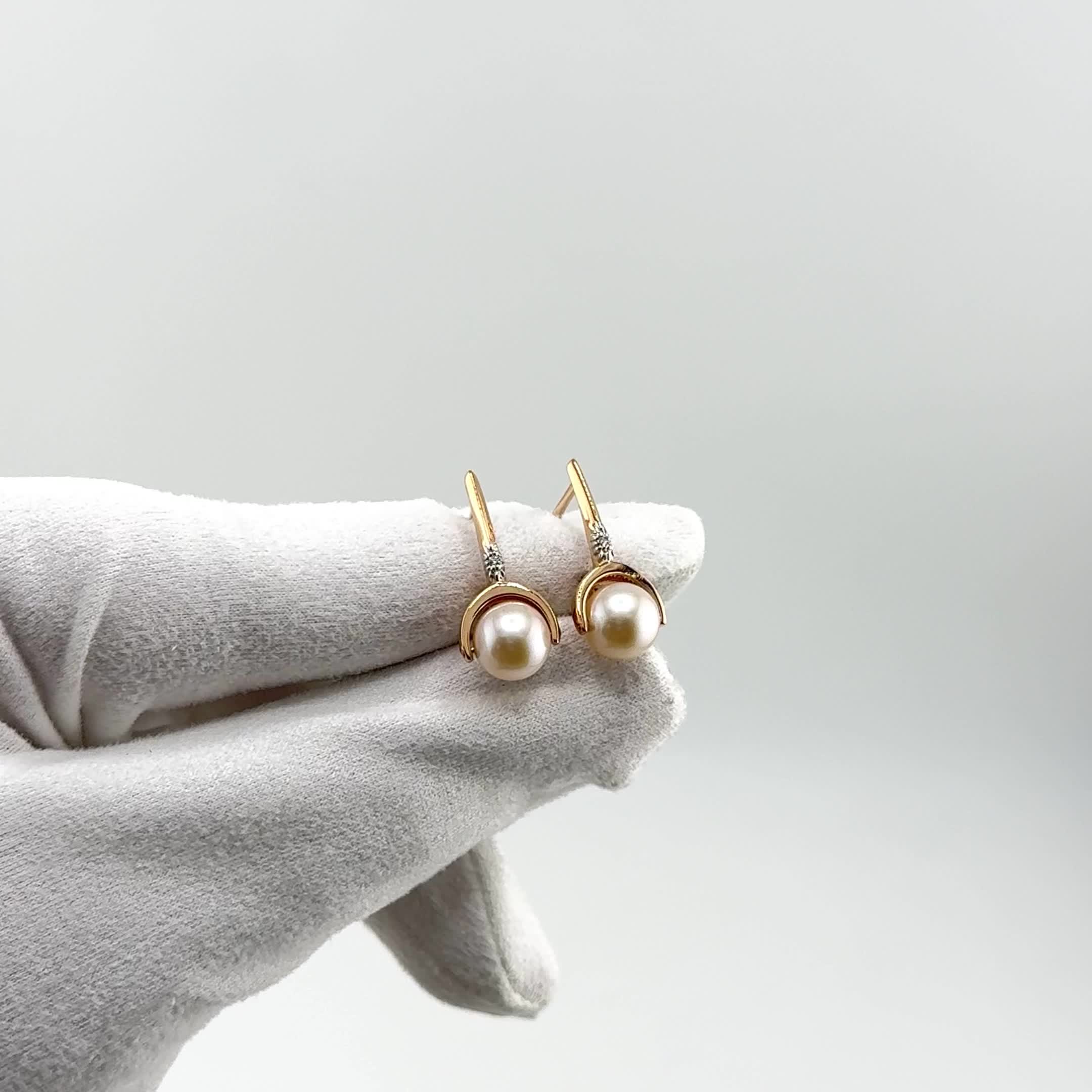 Серьги с жемчугом и фианитами из золота 585 пробы арт. 21804498