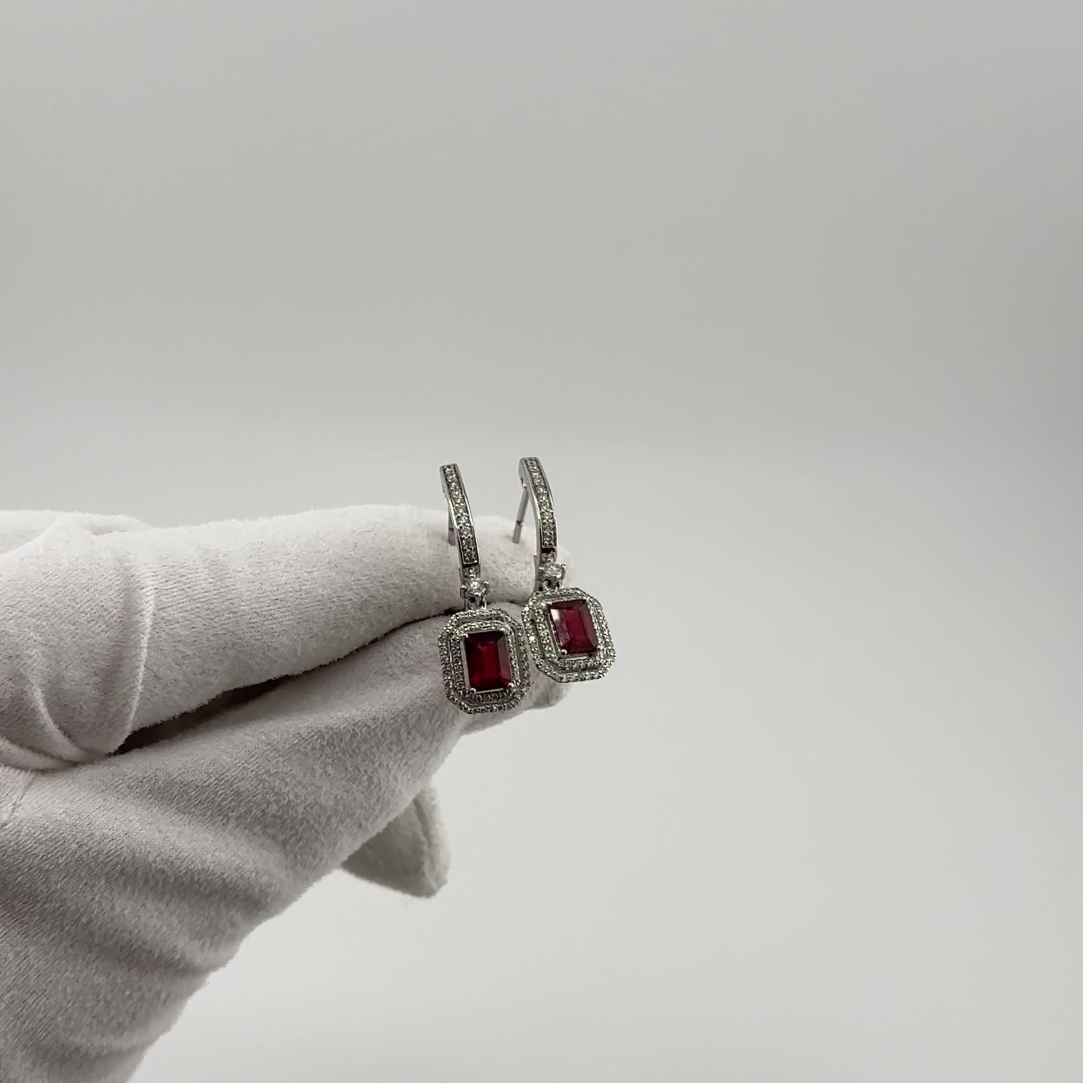 Серьги с рубинами и бриллиантами из белого золота 585 пробы арт. E1409-1009